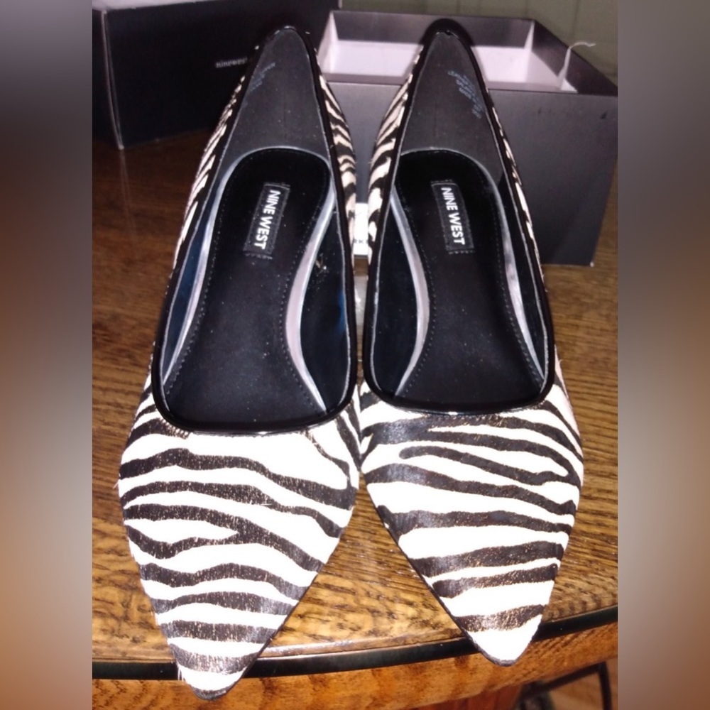 Nine West Brand. Zebra print pump. Size 7M. Never worn.
